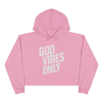 Pink "God Vibes Only" crop hoodie with hood and drawstrings, soft cotton blend, relaxed fit.